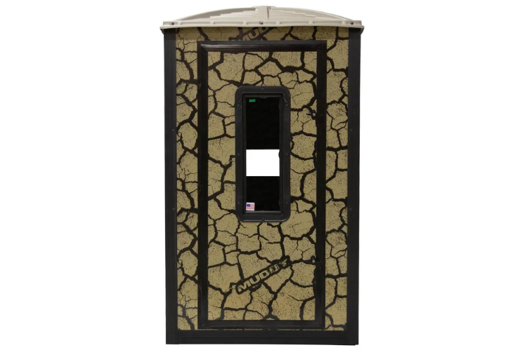 A Muddy Gunner box deer hunting blind with cracked mud camouflage and a sturdy steel 5 ft. tower.