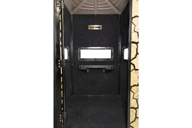 A Muddy Gunner box deer hunting blind with cracked mud camouflage and a sturdy steel 5 ft. tower.