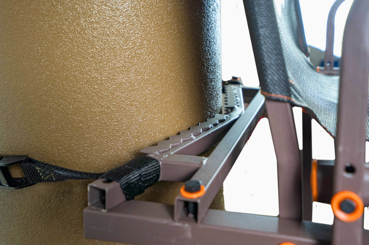 16 ft. Rhino tree stand RTL-202 with padded seat for long hunting sessions.