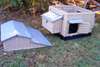 Snap Lock Big Chicken Coop with durable plastic construction in a backyard setting.