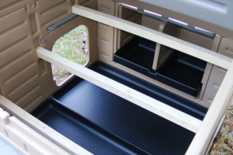 Large Plastic Snap Lock Chicken Coop with a Durable, Weather-Resistant Design.