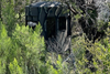 An elevated hunting blind from Banks Outdoors named The Stump for bow hunter with tinted windows for outdoor and hunting enthusiast.