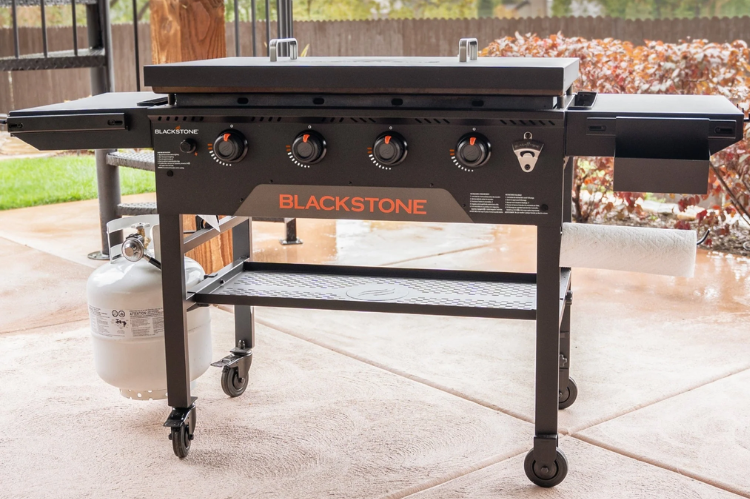 Blackstone 36" Omnivore Griddle 2212 with hard cover, durable Blackstone griddle station designed for even heat and outdoor cooking