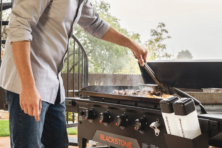 Blackstone 36" Omnivore Griddle 2212 with hard cover, durable Blackstone griddle station designed for even heat and outdoor cooking